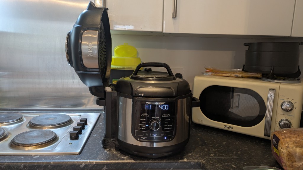The pressure lid locked in place on the Foodi Max. The Crisper lid stands vertical