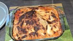A whole chicken lasagne with a brown cheese top in an oven dish